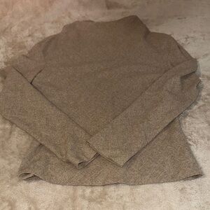 Woman’s Tan Sweater